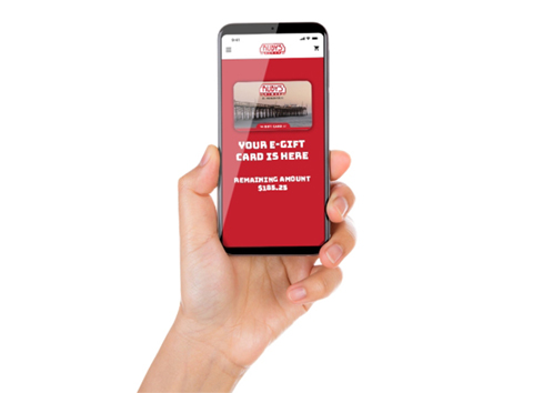 hand holding a mobile phone with the Ruby's app